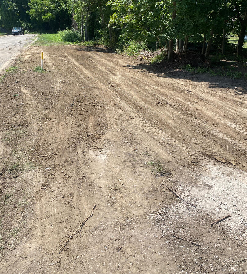 Rough grade after closing up a five foot open ditch